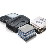 Safe & Save Bag™ featuring anti-theft compartments, water-resistant material, and expandable capacity with neatly folded clothes.
