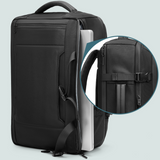 Safe & Save Bag™ with anti-theft compartments, water-resistant material, and USB charging port.