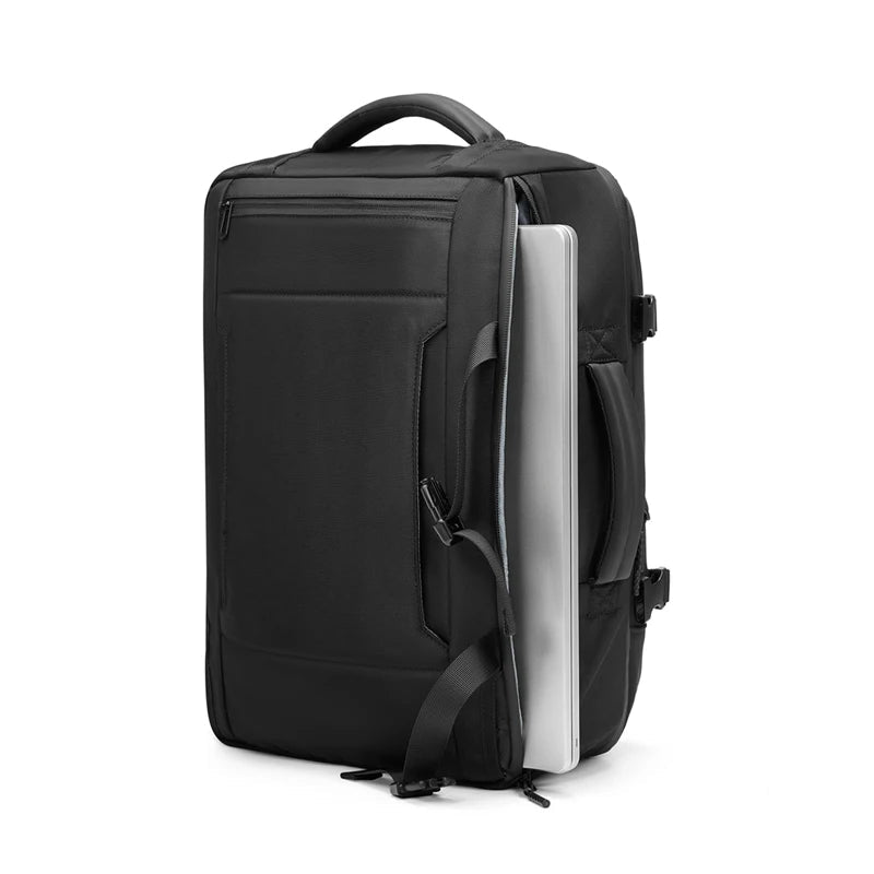 Safe & Save Bag™ featuring anti-theft compartments and USB charging port, shown with a laptop.