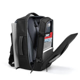 Safe & Save Bag™ with anti-theft compartments and expandable capacity, showing storage for a laptop and accessories.